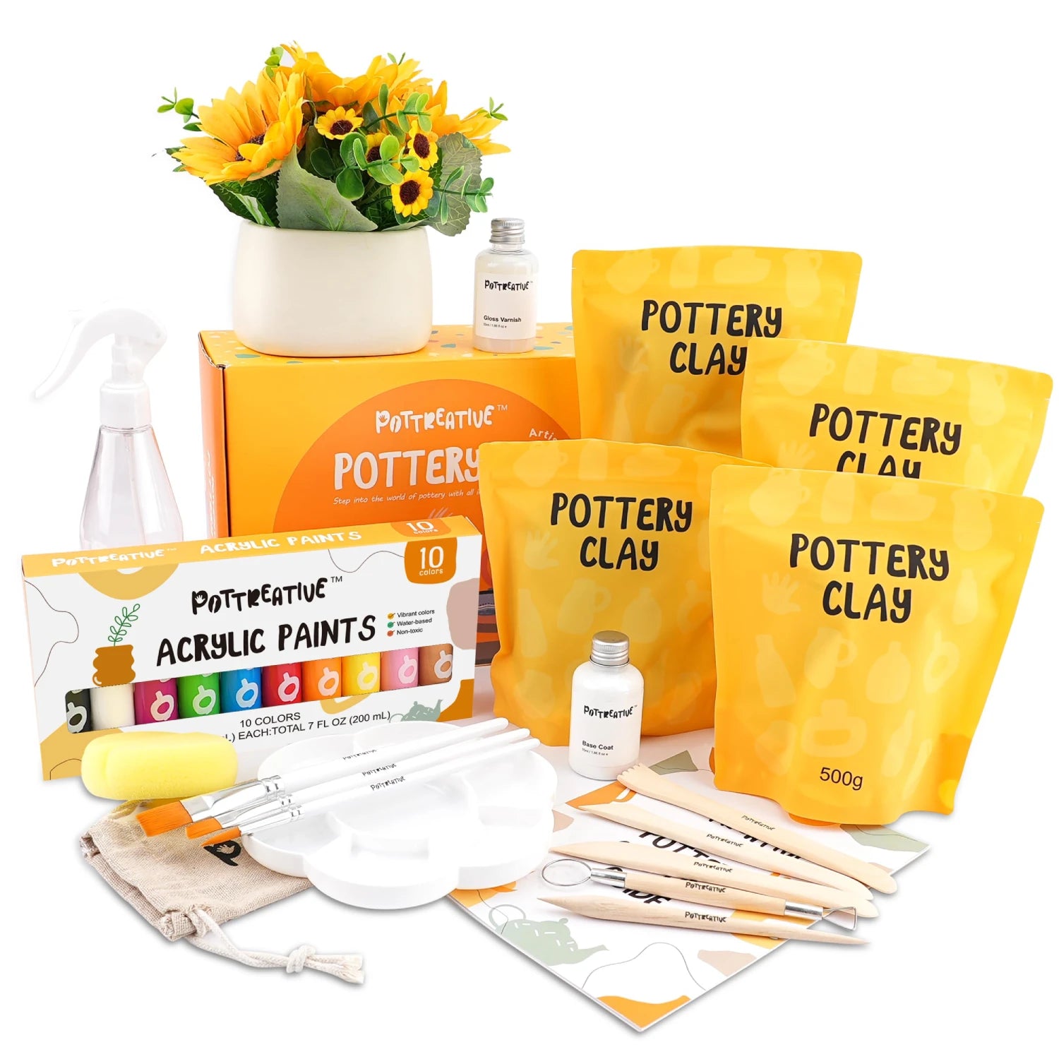 Pottery clay kit with paints, tools, and guide.
